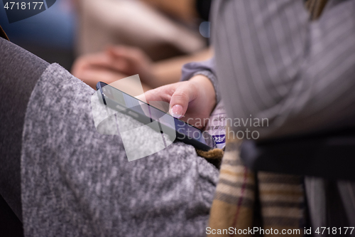 Image of business people hands using smart phone