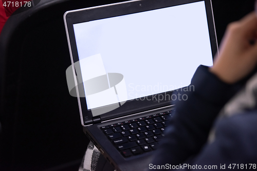Image of business people hands using laptop computer