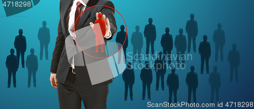 Image of Businessman touching virtual screen on blue background