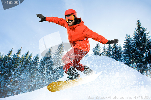 Image of Young man and winter sport, skiing against white alps mountains