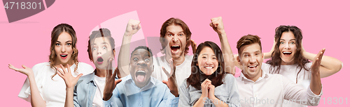 Image of Half-length close up portrait of young people on pink background.