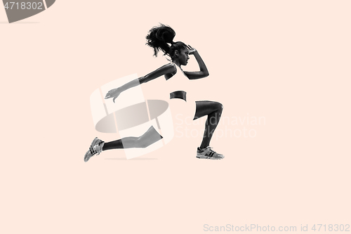 Image of Young african woman running or jogging, creative collage