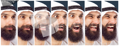 Image of Arabian saudi businessman on dark blue studio background