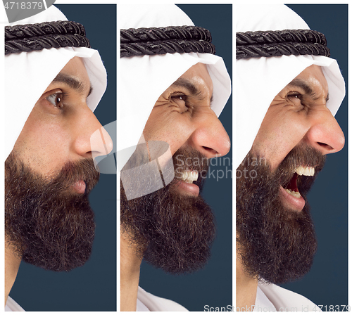 Image of Arabian saudi businessman on dark blue studio background