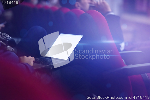 Image of business people hands using laptop computer