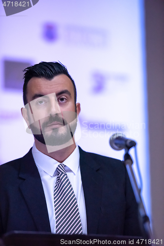 Image of businessman giving presentations at conference room