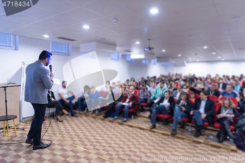 Image of businessman giving presentations at conference room