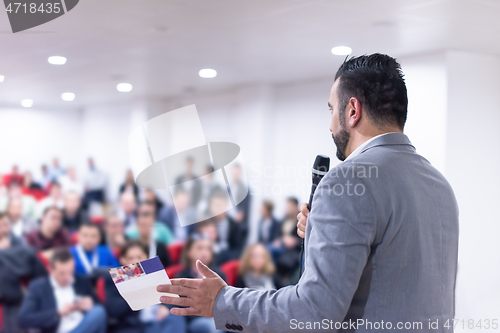 Image of businessman giving presentations at conference room