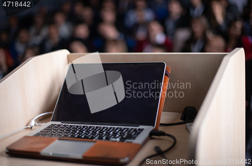 Image of laptop computer at podium