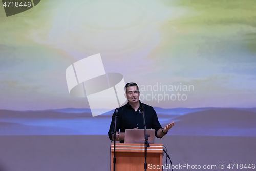 Image of businessman giving presentations at conference room