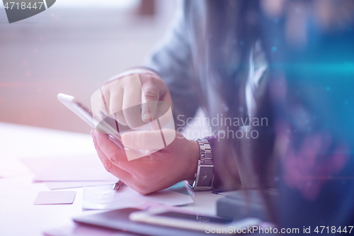 Image of business people hands using smart phone