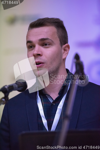 Image of businessman giving presentations at conference room