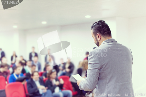 Image of businessman giving presentations at conference room