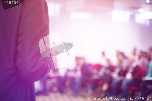 Image of businessman giving presentations at conference room