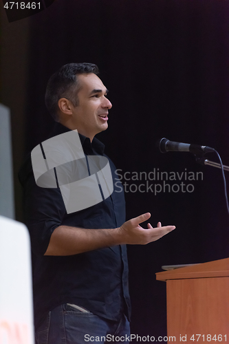 Image of businessman giving presentations at conference room