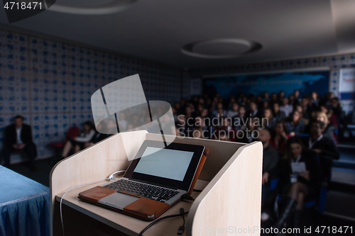 Image of laptop computer at podium