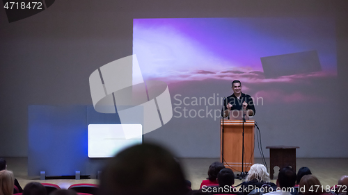 Image of businessman giving presentations at conference room