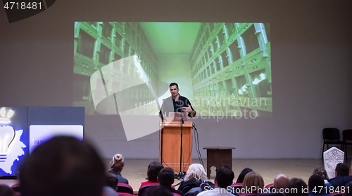 Image of businessman giving presentations at conference room