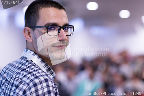 Image of businessman giving presentations at conference room