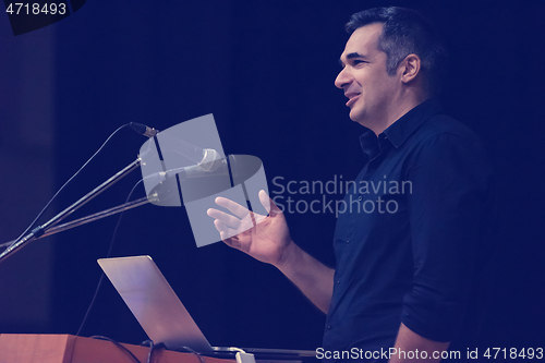 Image of businessman giving presentations at conference room