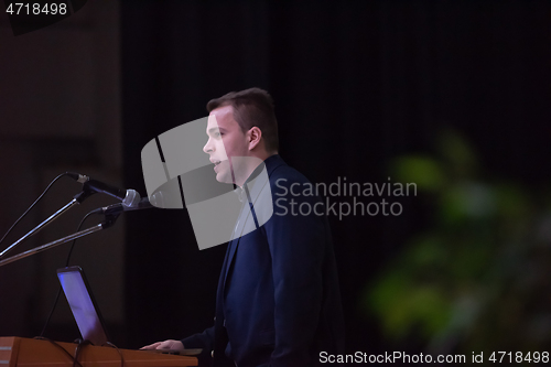 Image of businessman giving presentations at conference room