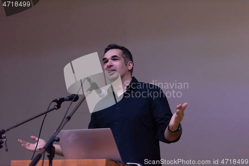 Image of businessman giving presentations at conference room