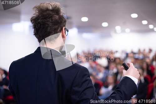 Image of businessman giving presentations at conference room