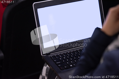 Image of business people hands using laptop computer