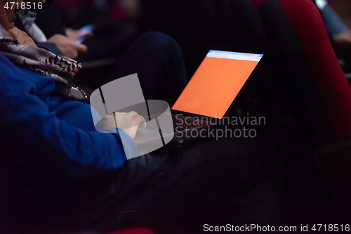 Image of business people hands using laptop computer