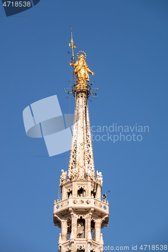 Image of golden Madonna statue at Cathedral Milan Italy