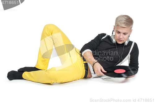 Image of Male with headphones and vinyl isolated on white