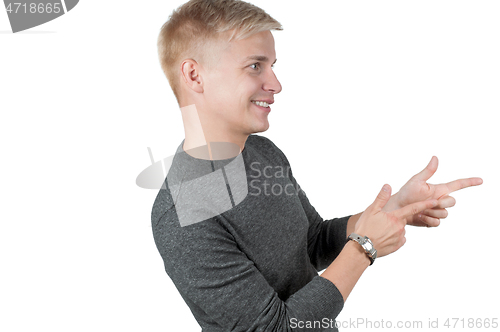 Image of Man in gray pointing with his fingers