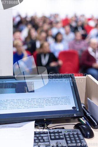 Image of laptop computer at podium