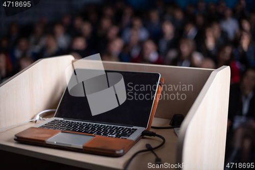 Image of laptop computer at podium