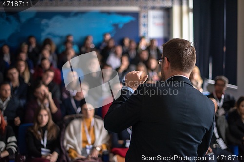 Image of businessman giving presentations at conference room