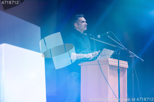 Image of businessman giving presentations at conference room