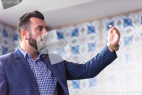 Image of businessman giving presentations at conference room