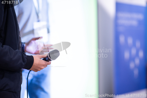 Image of businessman giving presentations at conference room