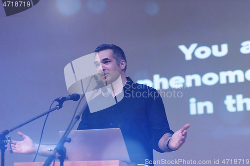 Image of businessman giving presentations at conference room