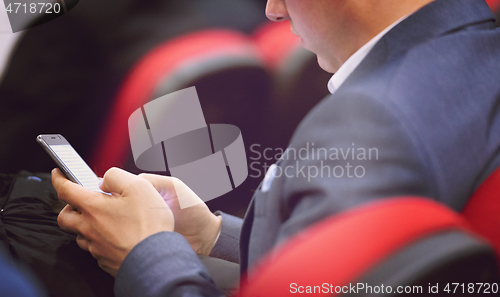 Image of business people hands using smart phone