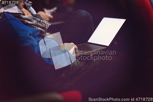 Image of business people hands using laptop computer