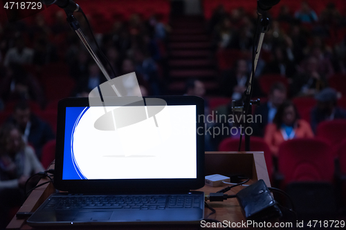 Image of laptop computer at podium