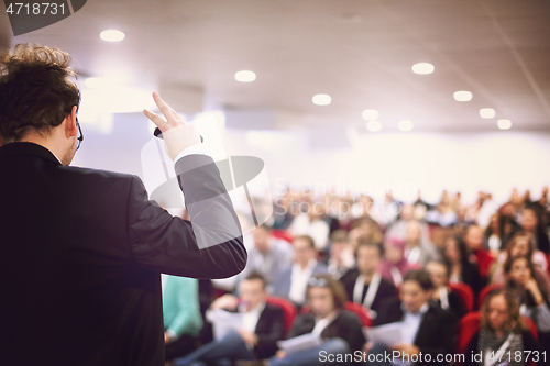 Image of businessman giving presentations at conference room