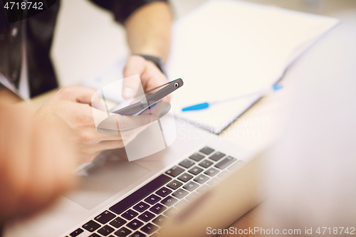 Image of business people hands using smart phone