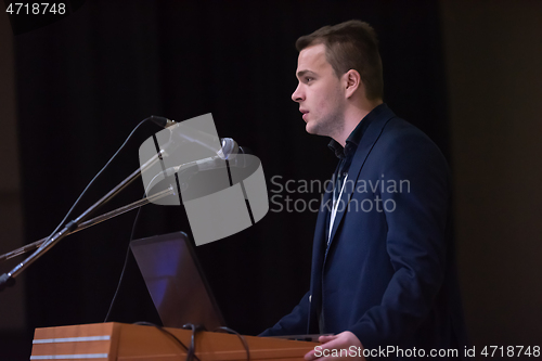 Image of businessman giving presentations at conference room