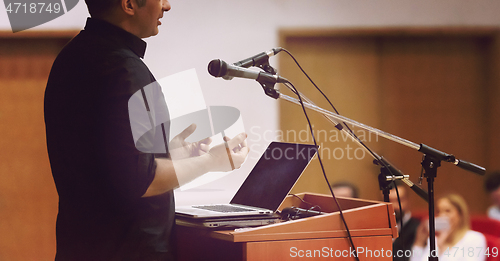 Image of businessman giving presentations at conference room