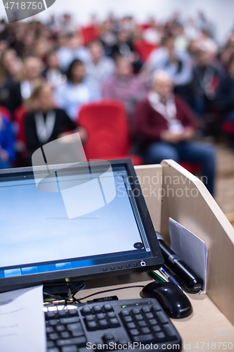 Image of laptop computer at podium