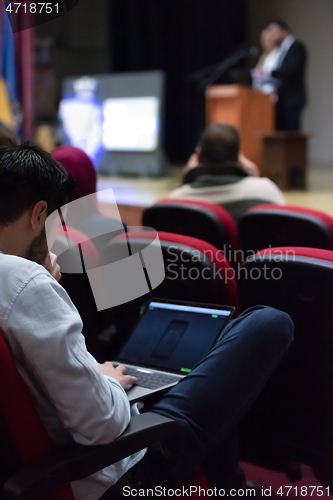 Image of business people hands using laptop computer