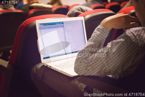 Image of business people hands using laptop computer