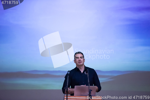 Image of businessman giving presentations at conference room